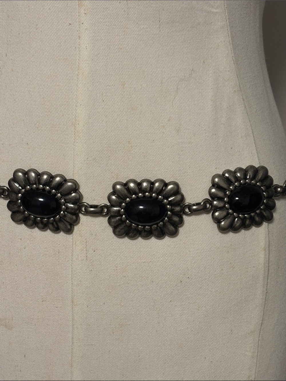 Brushed silver tone metal medallion chain belt
